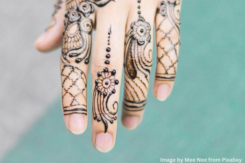 Elaborate mehndi patterns for a beautiful touch.