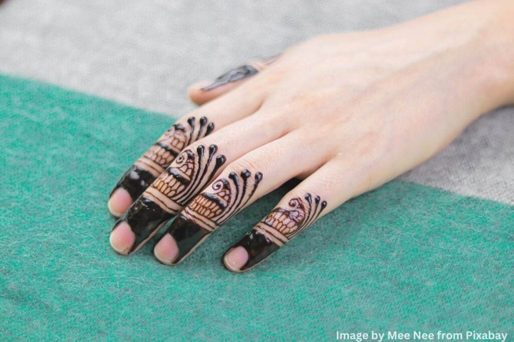 Elegant mehndi design enhancing hand's charm.