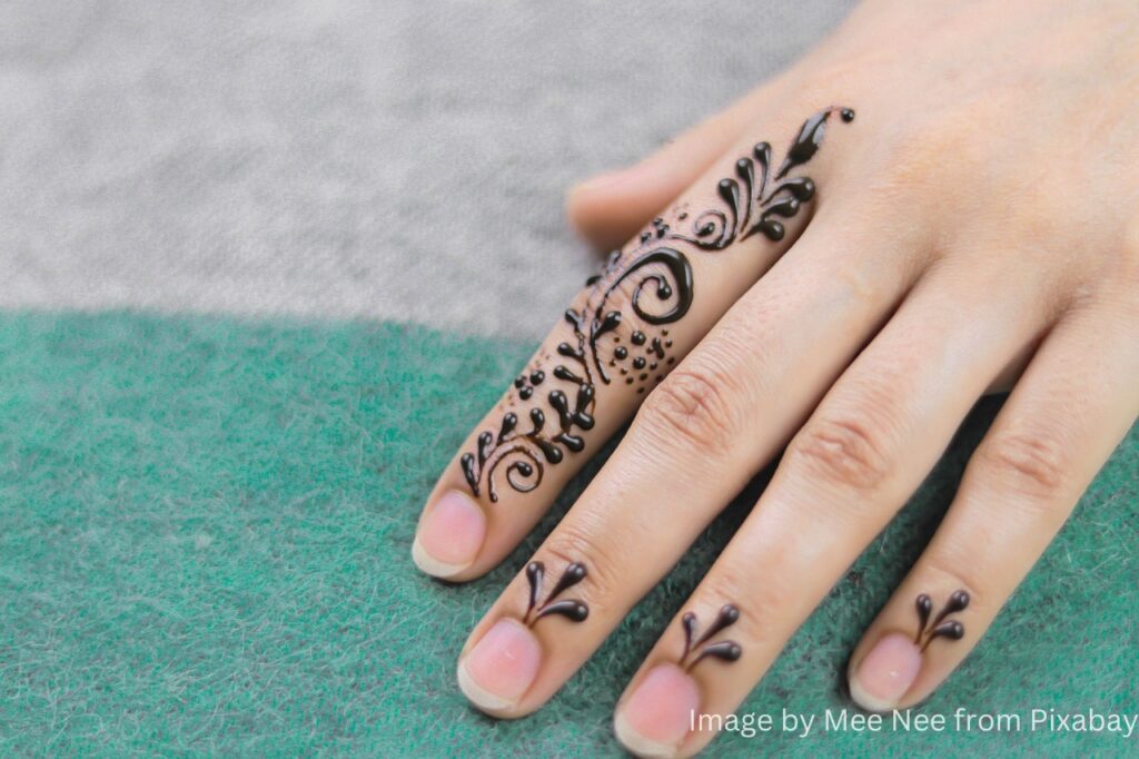 cultural tapestry of mehndi design on a woman hand.